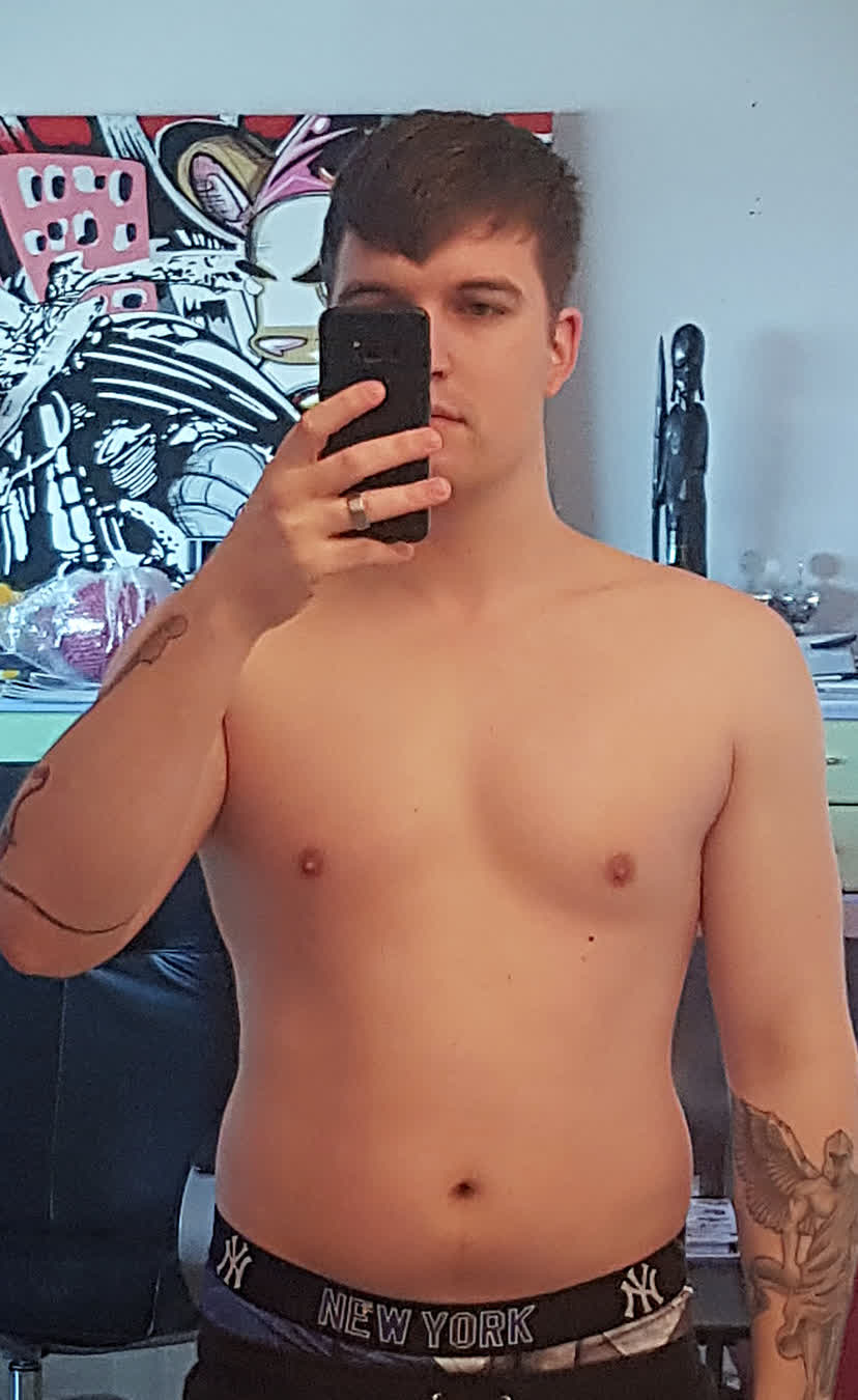 Rolo before, standing in a bedroom